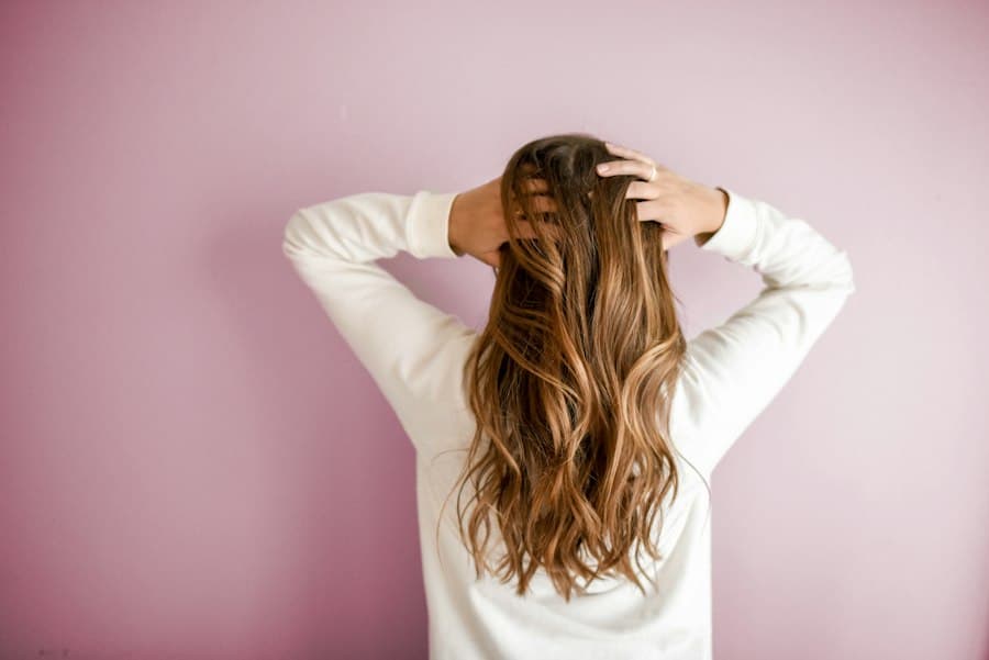 Long caramel balayage, worn loose and shown from behind