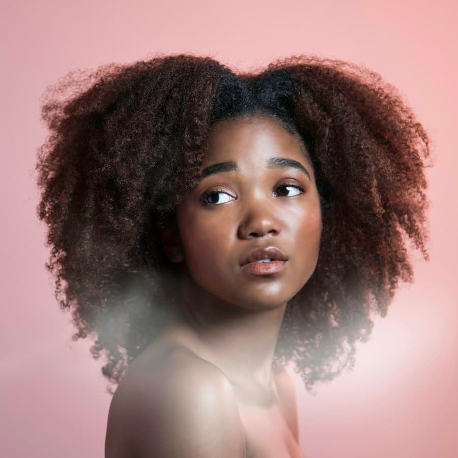 Natural curls shaped and defined into a rounded silhouette